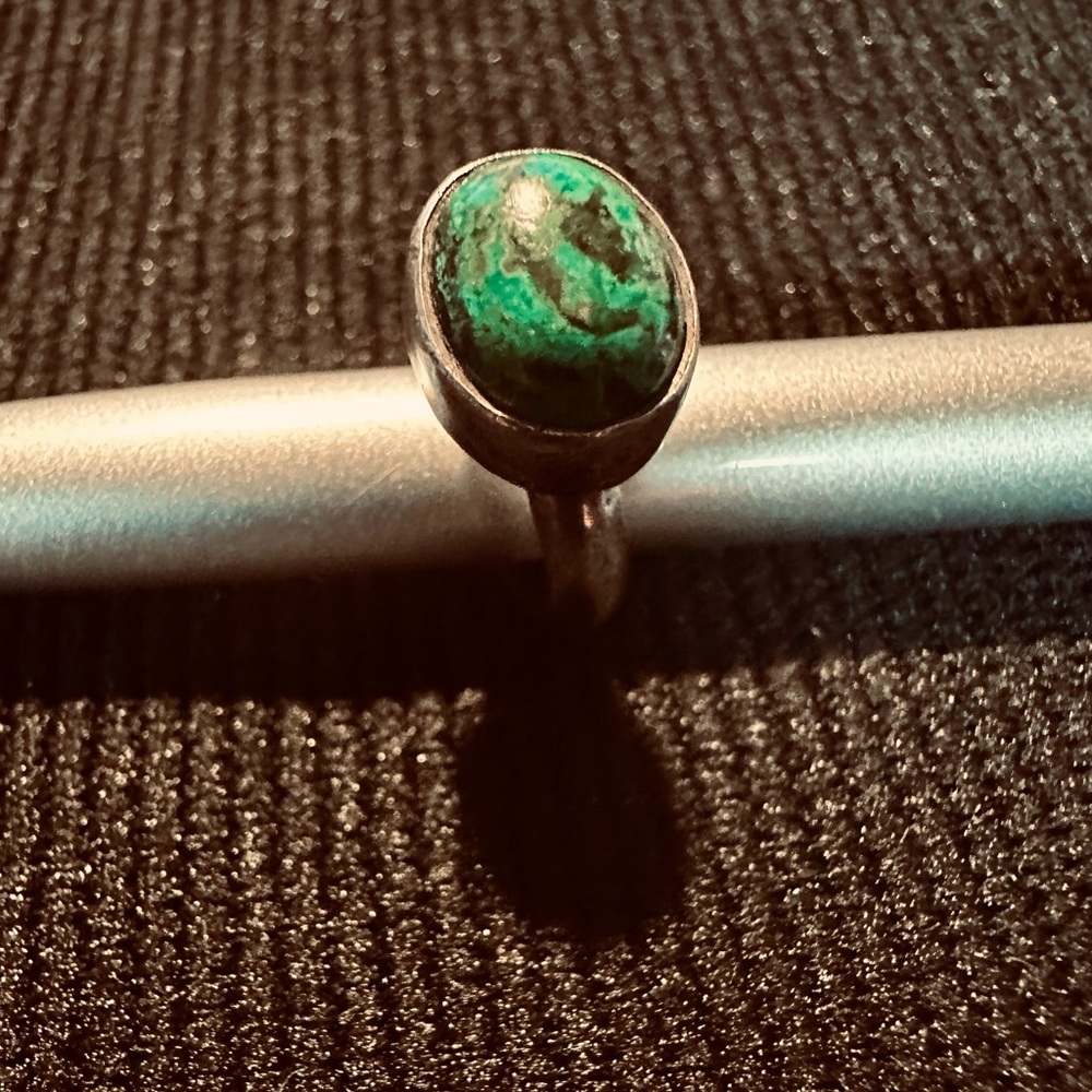 Adorable vintage turquoise in sterling silver ~ size 3. Patina as shown.